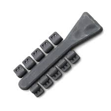 Black silicone ice cube tray on a white background