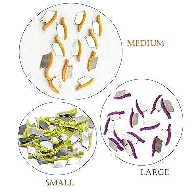 Brake pads in different sizes on a white background