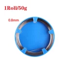 Blue and black spool of thread with text on a white background