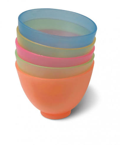 Flexible rubber dental mixing bowls in assorted colors used for mixing alginate and dental plaster.