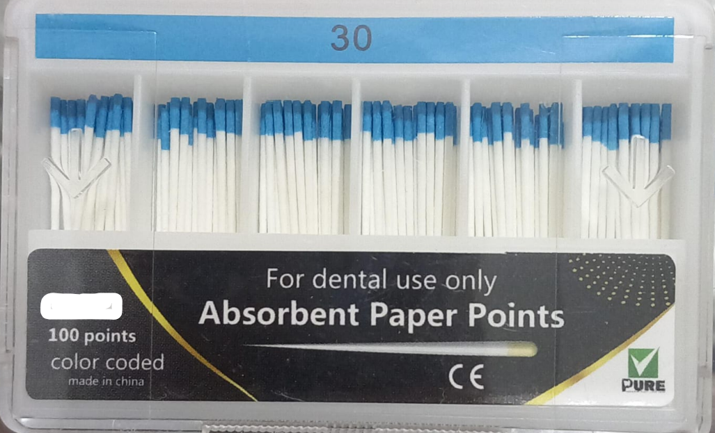 Pack of dental absorbent paper points with visible branding and product details.