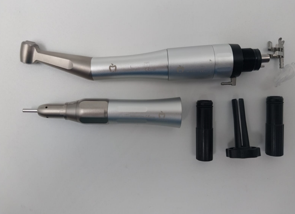 Dental tool with attachments on a light gray background