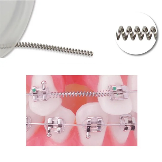 Metal orthodontic spring and bracket on a white background