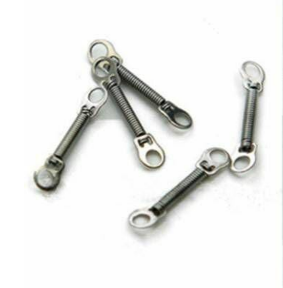 Metal spring-loaded toggle bolts on a white background