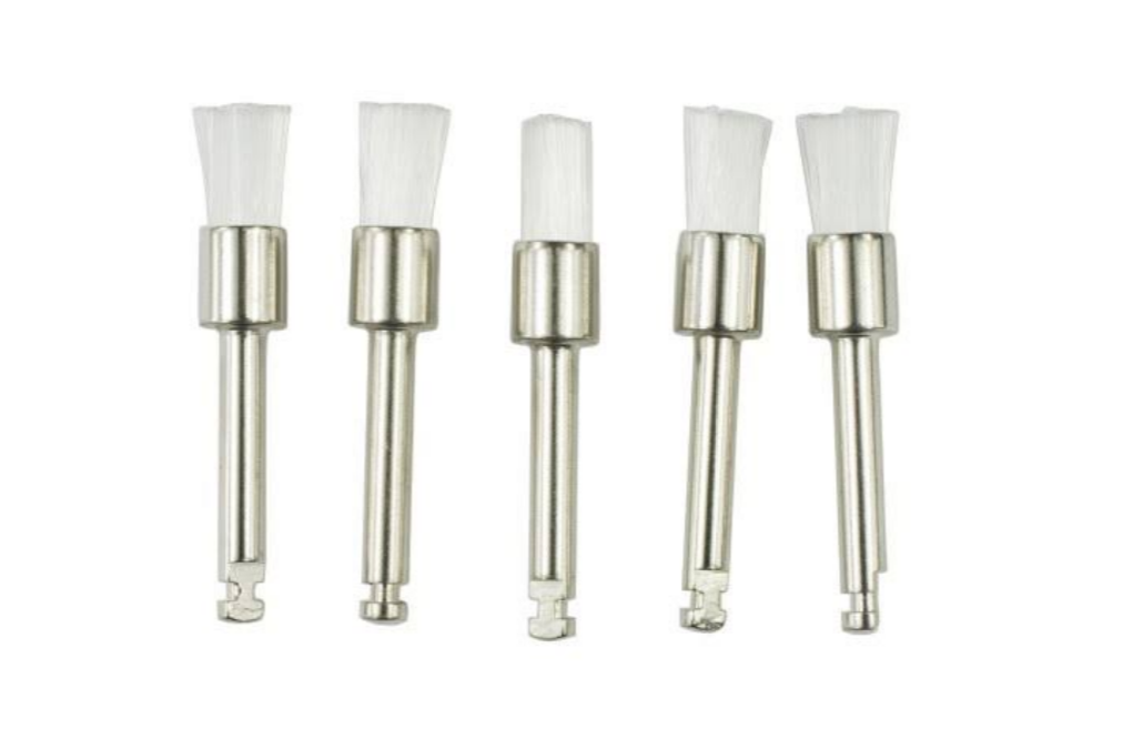Small linen dental polishing brush for achieving high-gloss finish on composite and ceramic restorations.