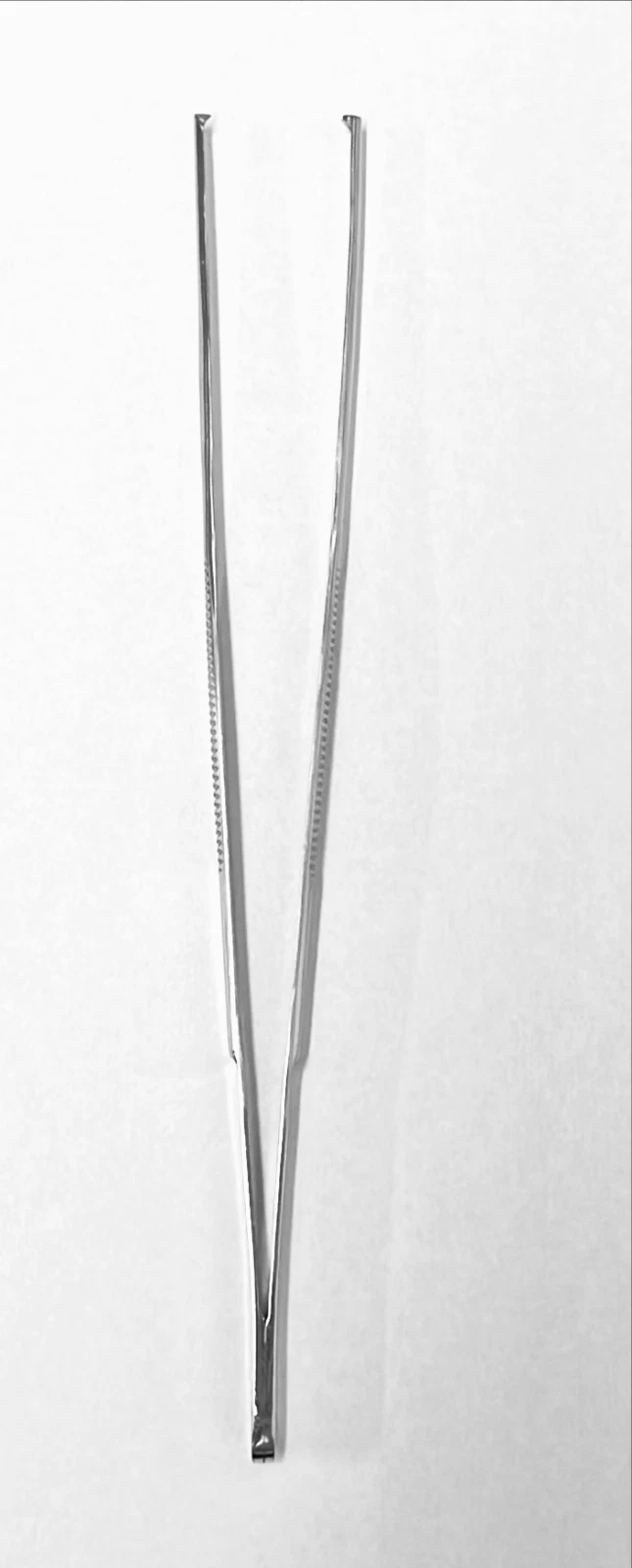 Two metal rods on a white background