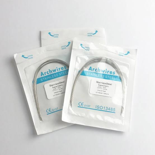 Three packages of Archwires stainless steel wires on a light gray background