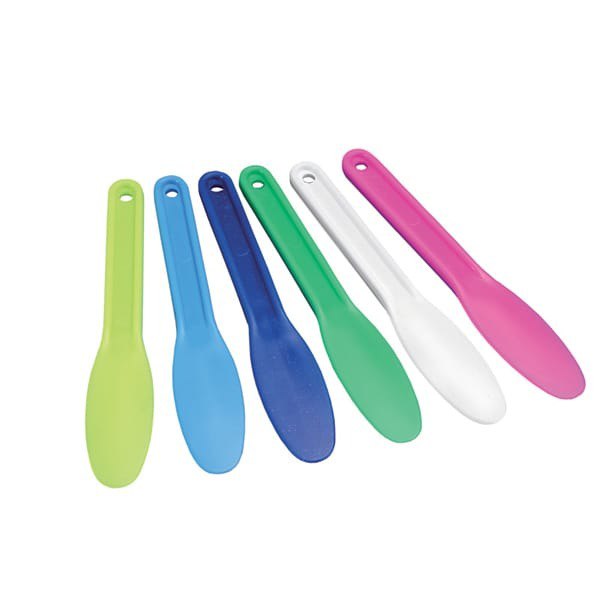 Flexible rubber dental mixing bowls in assorted colors used for mixing alginate and dental plaster.