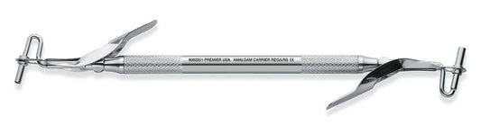Pakistan double end stainless steel amalgam carrier with regular and large tips and spring-loaded plunger for amalgam placement in restorative dentistry.