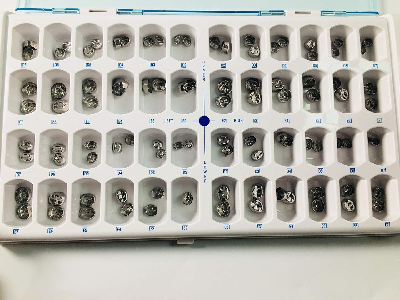 Stainless steel preformed primary molar crown for pediatric full coronal restoration following pulp therapy or extensive carious destruction.