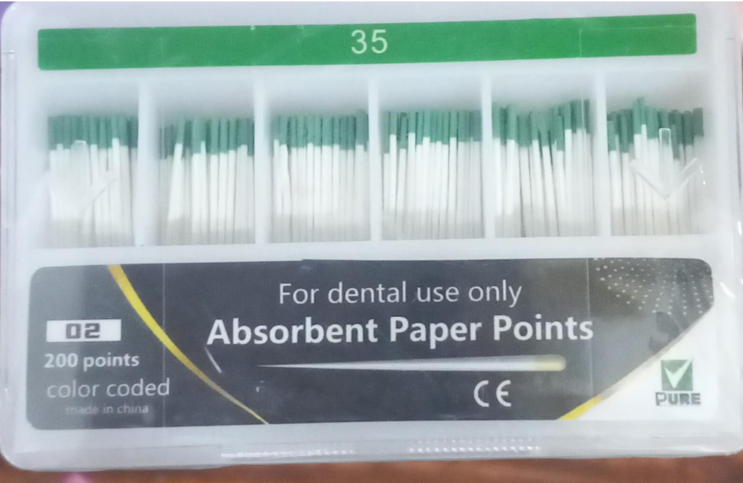 Packaging of dental absorbent paper points with visible branding and text.